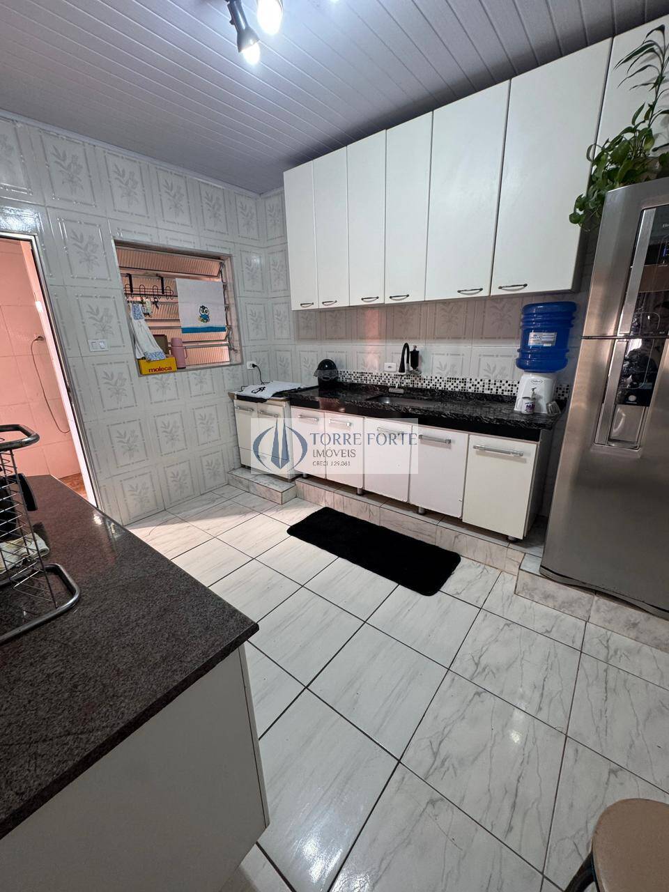 Casa à venda com 3 quartos, 125m² - Foto 1